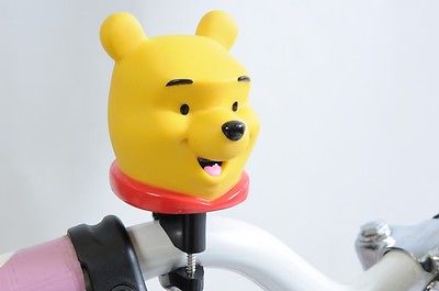WINNIE THE POOH & TIGGER GRIPS, WITH A WINNIE THE POOH HANDLEBAR HORN -SQUEAKER